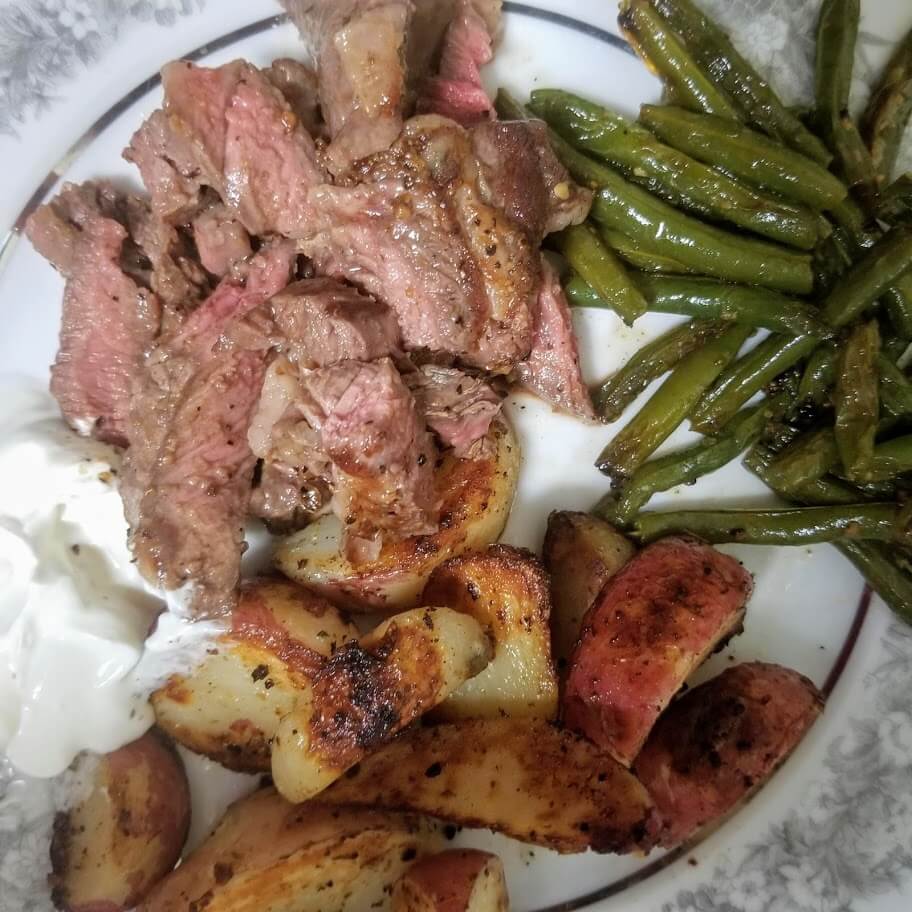 Steak And Potatoes On The Griddle